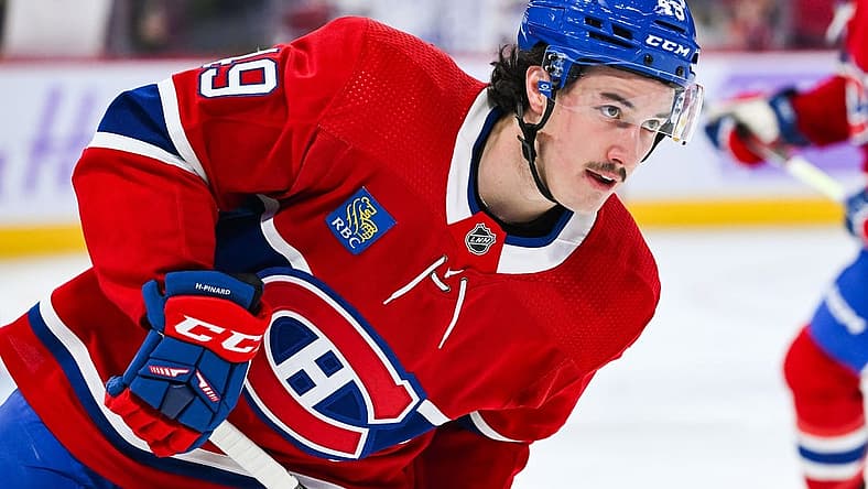 Nov 12, 2023; Montreal, Quebec, CAN; Montreal Canadiens left wing Rafael Harvey-Pinard (49) looks on during warm-up before the game against the Vancouver Canucks at Bell Centre. Mandatory Credit: David Kirouac-USA TODAY Sports