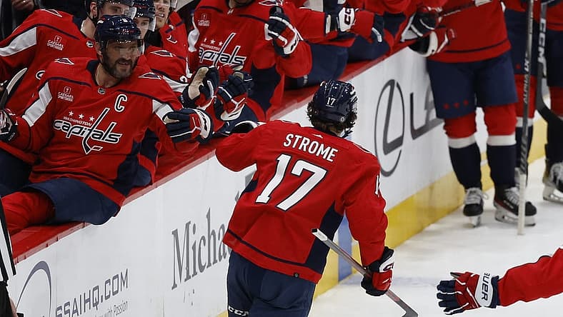 Nov 14, 2023; Washington, District of Columbia, USA; Washington Capitals center Dylan Strome (17) celebrates with teammates after scoring a goal against the Vegas Golden Knights in the first period at Capital One Arena. Mandatory Credit: Geoff Burke-USA TODAY Sports