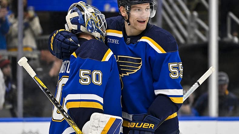 Nov 14, 2023; St. Louis, Missouri, USA; St. Louis Blues goaltender Jordan Binnington (50) and defenseman Colton Parayko (55) celebrate after the Blues defeated the Tampa Bay Lightning at Enterprise Center. Mandatory Credit: Jeff Curry-USA TODAY Sports