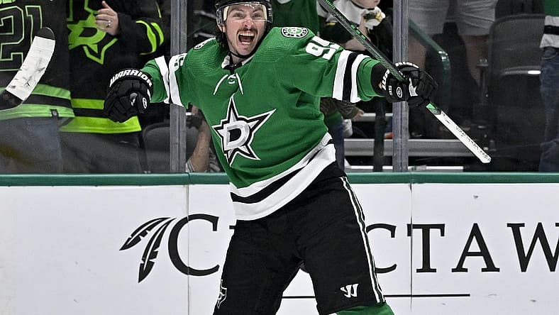 Nov 14, 2023; Dallas, Texas, USA; Dallas Stars center Matt Duchene (95) celebrates after he scores the game winning goal against the Arizona Coyotes during the overtime period at the American Airlines Center. Mandatory Credit: Jerome Miron-USA TODAY Sports