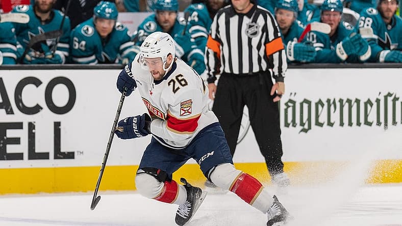 Nov 14, 2023; San Jose, California, USA; Florida Panthers defenseman Uvis Balinskis (26) controls the puck during the first period against the San Jose Sharks at SAP Center at San Jose. Mandatory Credit: Stan Szeto-USA TODAY Sports