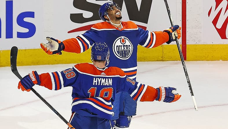 Nov 15, 2023; Edmonton, Alberta, CAN; Edmonton Oilers forward Evander Kane (91) celebrates his over-time winning goal against the Seattle Kraken at Rogers Place. Mandatory Credit: Perry Nelson-USA TODAY Sports
