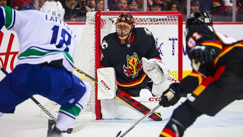 Nov 16, 2023; Calgary, Alberta, CAN; Calgary Flames goaltender Jacob Markstrom (25) guards his net against
Vancouver Canuck during the first period at Scotiabank Saddledome. Mandatory Credit: Sergei Belski-USA TODAY Sports
