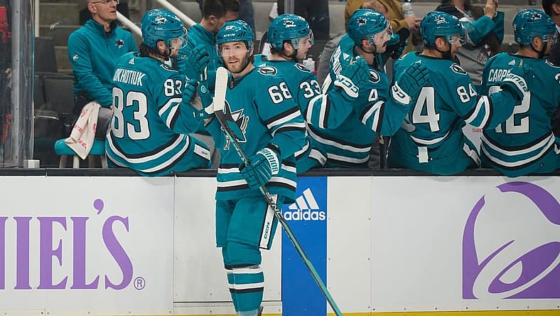 Nov 16, 2023; San Jose, California, USA; San Jose Sharks left wing Mike Hoffman (68) shakes hands with his teammates on the bench after scoring a goal against the St. Louis Blues during the first period at SAP Center at San Jose. Mandatory Credit: Robert Edwards-USA TODAY Sports