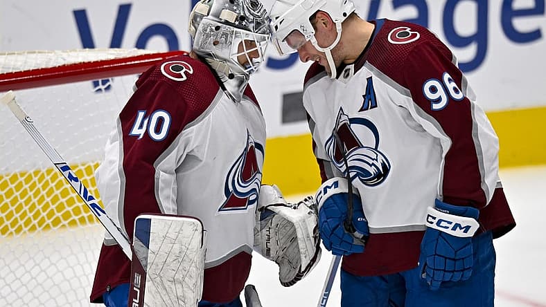 Nov 18, 2023; Dallas, Texas, USA; Colorado Avalanche right wing Mikko Rantanen (96) and goaltender Alexandar Georgiev (40) celebrate after the Avalanche victory over the Dallas Stars at the American Airlines Center. Mandatory Credit: Jerome Miron-USA TODAY Sports