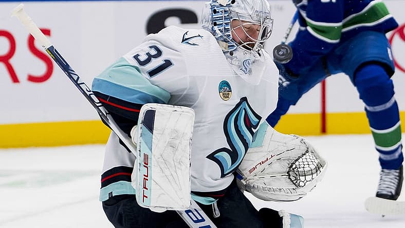 Nov 18, 2023; Vancouver, British Columbia, CAN; Seattle Kraken goalie Philipp Grubauer (31) makes a save against the Seattle Kraken in the first period at Rogers Arena. Mandatory Credit: Bob Frid-USA TODAY Sports