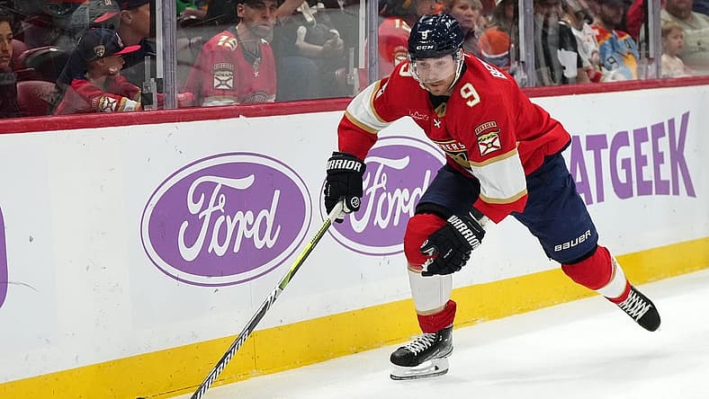 Nov 20, 2023; Sunrise, Florida, USA; Florida Panthers center Sam Bennett (9) chases a loose puck during the first period against the Edmonton Oilers at Amerant Bank Arena. Mandatory Credit: Jasen Vinlove-USA TODAY Sports