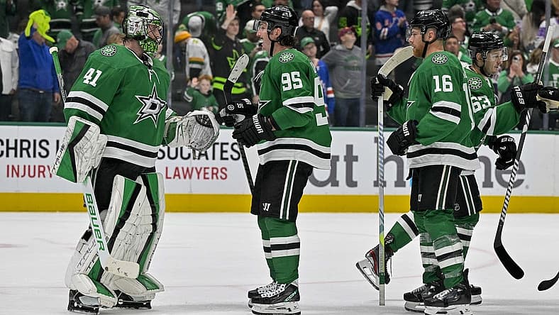 Nov 20, 2023; Dallas, Texas, USA; Dallas Stars goaltender Scott Wedgewood (41) and center Matt Duchene (95) and center Joe Pavelski (16) celebrate on the ice after the Stars victory over the New York Rangers at the American Airlines Center. Mandatory Credit: Jerome Miron-USA TODAY Sports