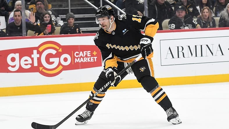 Nov 16, 2023; Pittsburgh, Pennsylvania, USA; Pittsburgh Penguins right wing Bryan Rust (17) against the New Jersey Devils during the first period at PPG Paints Arena. Mandatory Credit: Philip G. Pavely-USA TODAY Sports