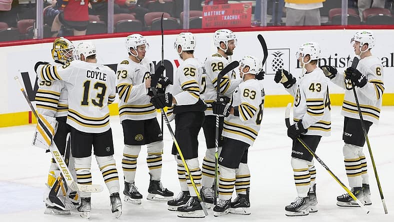 Nov 22, 2023; Sunrise, Florida, USA; The Boston Bruins celebrate after winning the game against the Florida Panthers at Amerant Bank Arena. Mandatory Credit: Sam Navarro-USA TODAY Sports