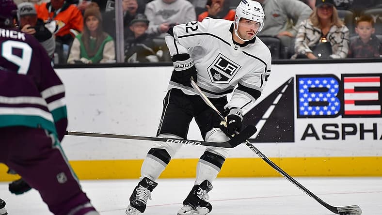 Nov 24, 2023; Anaheim, California, USA; Los Angeles Kings left wing Kevin Fiala (22) moves the puck against the Anaheim Ducks during the first period at Honda Center. Mandatory Credit: Gary A. Vasquez-USA TODAY Sports