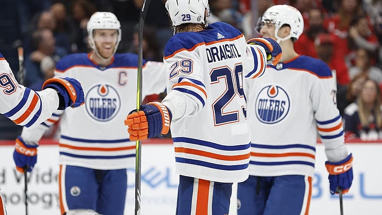 Nov 24, 2023; Washington, District of Columbia, USA; Edmonton Oilers center Leon Draisaitl (29) celebrates with teammates after scoring a goal against the Washington Capitals in the second period at Capital One Arena. Mandatory Credit: Geoff Burke-USA TODAY Sports