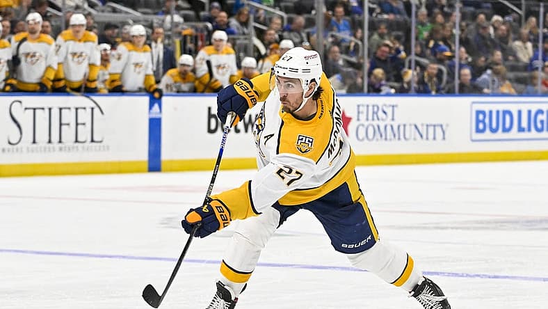 Nov 24, 2023; St. Louis, Missouri, USA; Nashville Predators defenseman Ryan McDonagh (27) shoots against the St. Louis Blues during the third period at Enterprise Center. Mandatory Credit: Jeff Curry-USA TODAY Sports