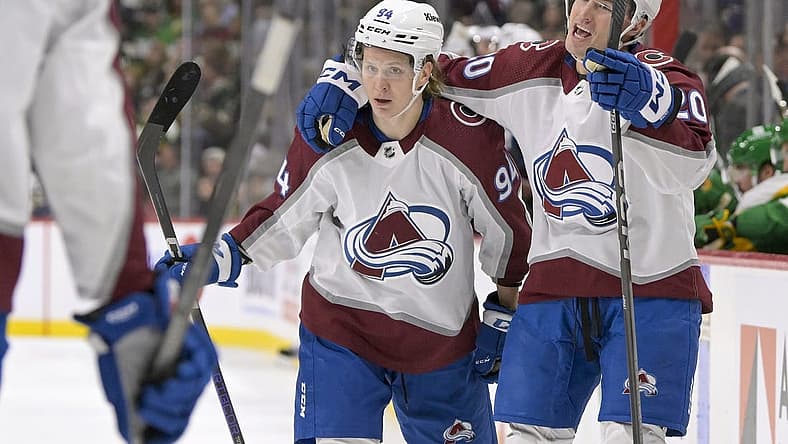 Nov 24, 2023; Saint Paul, Minnesota, USA; Colorado Avalanche forward Ross Colton (20) celebrates his goal against the Minnesota Wild with forward forward Joel Kiviranta (94) during the first period at Xcel Energy Center. Mandatory Credit: Nick Wosika-USA TODAY Sports