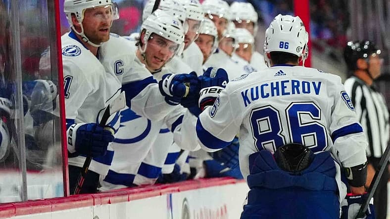 Nov 24, 2023; Raleigh, North Carolina, USA; Tampa Bay Lightning right wing Nikita Kucherov (86) celebrates his goal against the Carolina Hurricanes during the second period at PNC Arena. Mandatory Credit: James Guillory-USA TODAY Sports