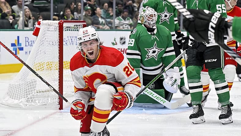 Nov 24, 2023; Dallas, Texas, USA; Calgary Flames center Blake Coleman (20) celebrates after scoring a goal against Dallas Stars goaltender Jake Oettinger (29) during the third period at the American Airlines Center. Mandatory Credit: Jerome Miron-USA TODAY Sports