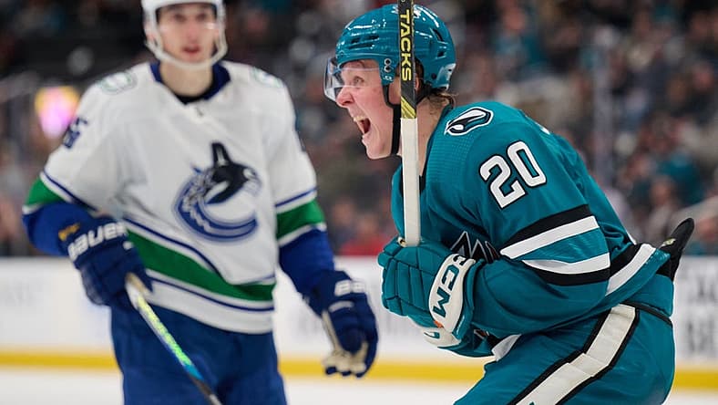 Nov 25, 2023; San Jose, California, USA; San Jose Sharks left wing Fabian Zetterlund (20) reacts after scoring a goal against the Vancouver Canucks during the second period at SAP Center at San Jose. Mandatory Credit: Robert Edwards-USA TODAY Sports