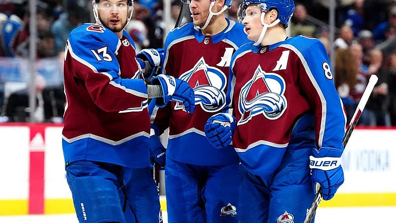 Nov 27, 2023; Denver, Colorado, USA; Colorado Avalanche defenseman Cale Makar (8) celebrates his goal with right wing Mikko Rantanen (96) and right wing Valeri Nichushkin (13) in the second period at Ball Arena. Mandatory Credit: Ron Chenoy-USA TODAY Sports