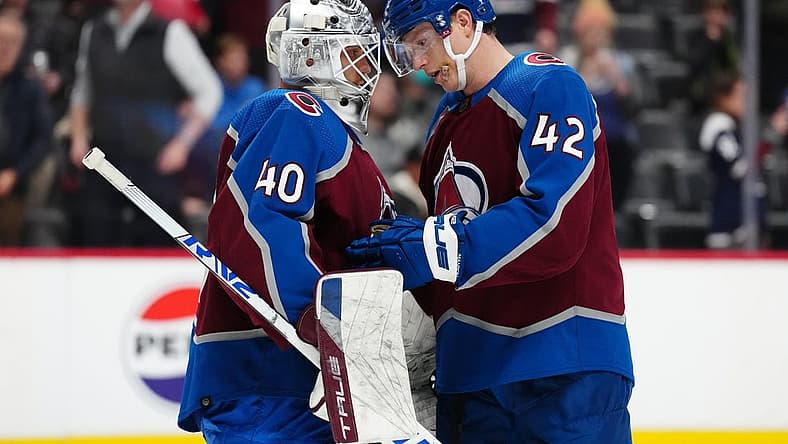 Nov 27, 2023; Denver, Colorado, USA; Colorado Avalanche goaltender Alexandar Georgiev (40) and defenseman Josh Manson (42) celebrate the win over the Tampa Bay Lightning at Ball Arena. Mandatory Credit: Ron Chenoy-USA TODAY Sports