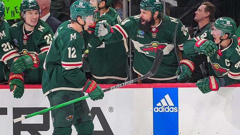 Nov 28, 2023; Saint Paul, Minnesota, USA; Minnesota Wild left wing Matt Boldy (12) celebrates his goal against the St. Louis Blues in the third period at Xcel Energy Center. Mandatory Credit: Brad Rempel-USA TODAY Sports