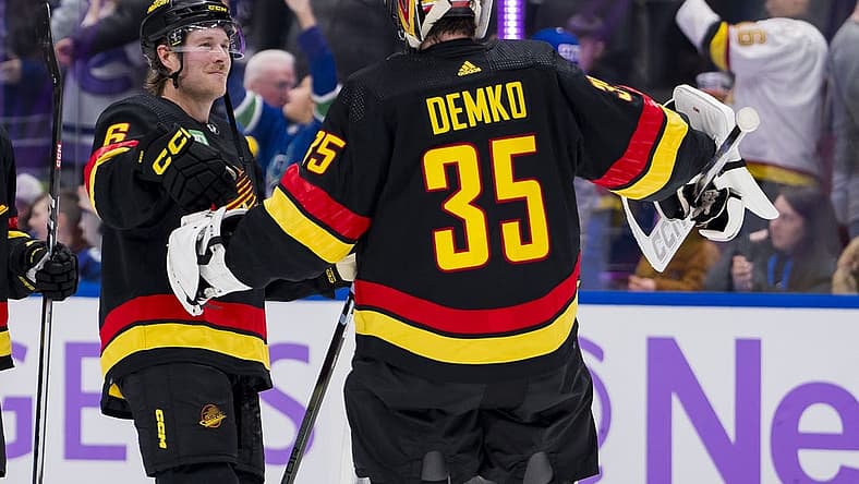 Nov 28, 2023; Vancouver, British Columbia, CAN; Vancouver Canucks forward Brock Boeser (6) and goalie Thatcher Demko (35) celebrate thier victory against the Anaheim Ducks at Rogers Arena. Vancouver won 3-1. Mandatory Credit: Bob Frid-USA TODAY Sports