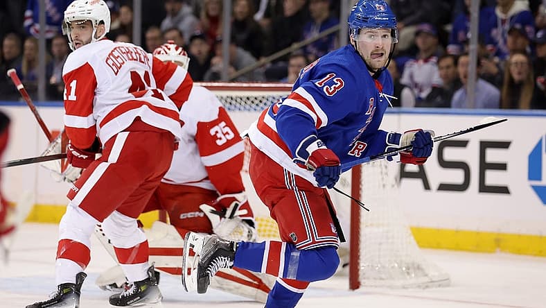 Nov 29, 2023; New York, New York, USA; New York Rangers left wing Alexis Lafreniere (13) skates against Detroit Red Wings defenseman Shayne Gostisbehere (41) and goaltender Ville Husso (35) during the first period at Madison Square Garden. Mandatory Credit: Brad Penner-USA TODAY Sports
