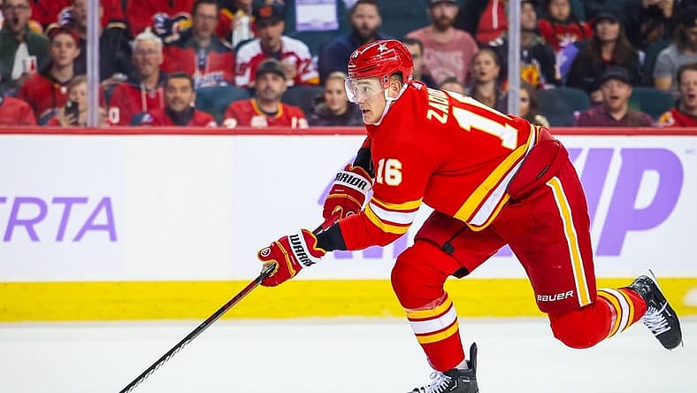 Nov 27, 2023; Calgary, Alberta, CAN; Calgary Flames defenseman Nikita Zadorov (16) skates with the puck against the Vegas Golden Knights during the second period at Scotiabank Saddledome. Mandatory Credit: Sergei Belski-USA TODAY Sports