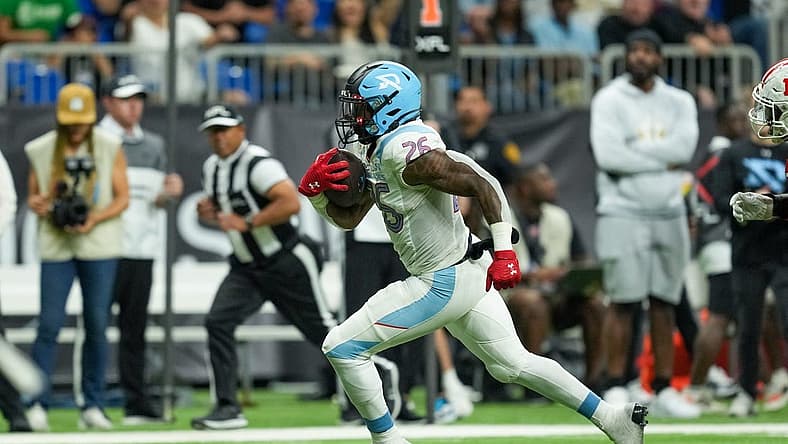 May 13, 2023; San Antonio, TX, USA; Arlington Renegades running back Leddie Brown (26) runs for a score in the second half against the DC Defenders at the Alamodome. Mandatory Credit: Daniel Dunn-USA TODAY Sports