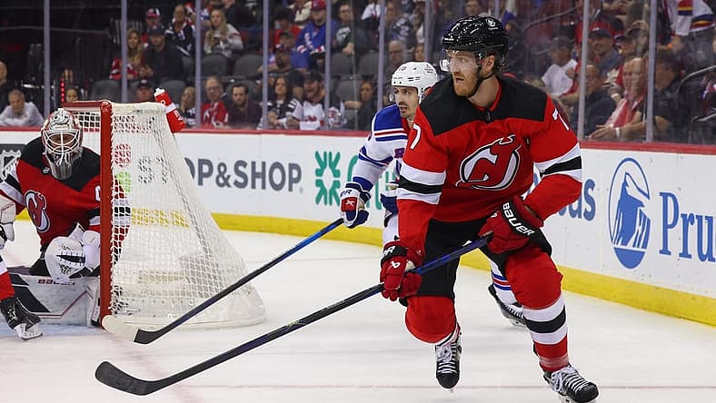 Oct 4, 2023; New York, New Jersey, USA; New Jersey Devils defenseman Dougie Hamilton (7) skates with the puck against the New York Rangers during the first period at Prudential Center. Mandatory Credit: Ed Mulholland-USA TODAY Sports