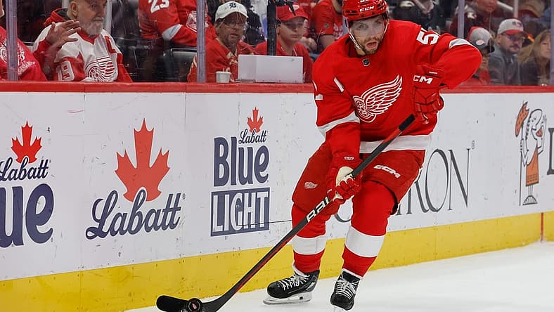 Oct 22, 2023; Detroit, Michigan, USA; Detroit Red Wings left wing David Perron (57) skates with the puck in the third period against the Calgary Flames at Little Caesars Arena. Mandatory Credit: Rick Osentoski-USA TODAY Sports