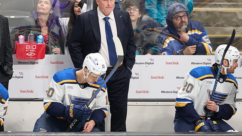 Nov 16, 2023; San Jose, California, USA; St. Louis Blues head coach Craig Berube watches the game from the bench against the San Jose Sharks during the third period at SAP Center at San Jose. Mandatory Credit: Robert Edwards-USA TODAY Sports