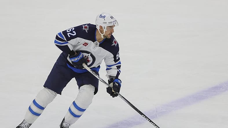 Nov 24, 2023; Sunrise, Florida, USA; Winnipeg Jets right wing Nino Niederreiter (62) moves the puck against the Florida Panthers during the third period at Amerant Bank Arena. Mandatory Credit: Sam Navarro-USA TODAY Sports