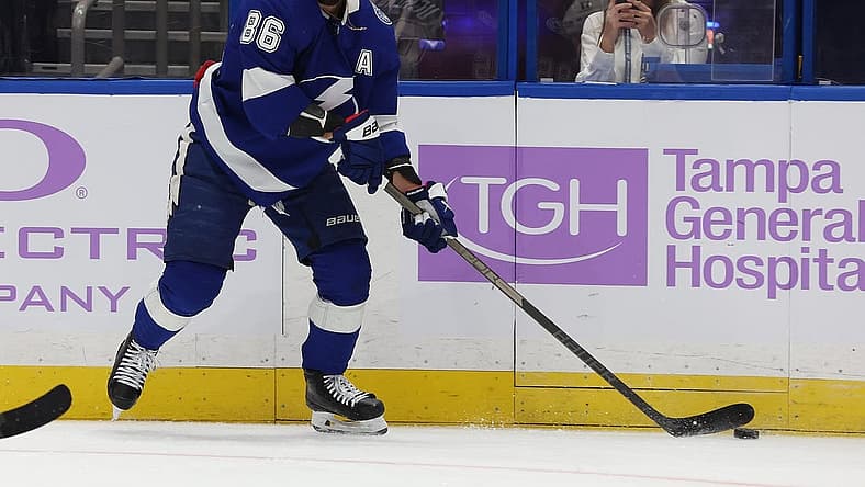 Nov 30, 2023; Tampa, Florida, USA; Tampa Bay Lightning right wing Nikita Kucherov (86) passes the puck against the Pittsburgh Penguins during the first period at Amalie Arena. Mandatory Credit: Kim Klement Neitzel-USA TODAY Sports