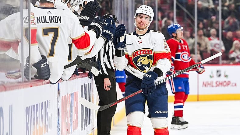 Nov 30, 2023; Montreal, Quebec, CAN; Florida Panthers center Evan Rodrigues (17) celebrates his goal against the Montreal Canadiens with his teammates at the bench during the third period at Bell Centre. Mandatory Credit: David Kirouac-USA TODAY Sports