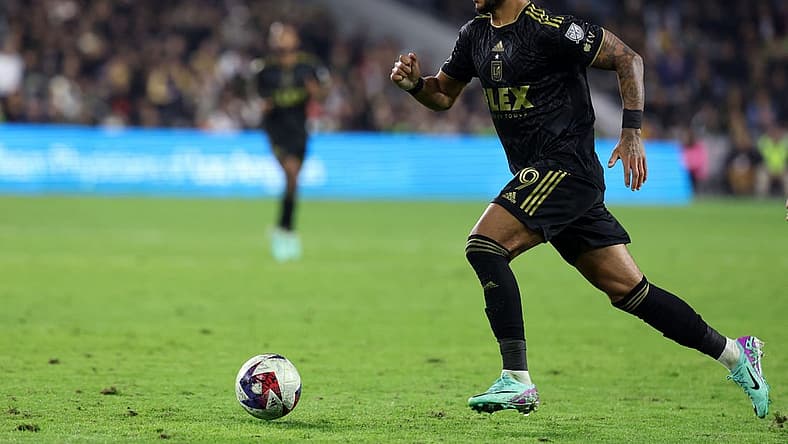Dec 2, 2023; Los Angeles, California, USA; Los Angeles FC forward Denis Bouanga (99) dribbles the ball during the second half against the Houston Dynamo at BMO Stadium. Mandatory Credit: Kiyoshi Mio-USA TODAY Sports