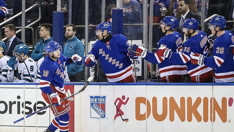 Dec 3, 2023; New York, New York, USA; New York Rangers left wing Artemi Panarin (10) is greeted by his teammates after scoring a goal in the first period against the San Jose Sharks at Madison Square Garden. Mandatory Credit: Wendell Cruz-USA TODAY Sports