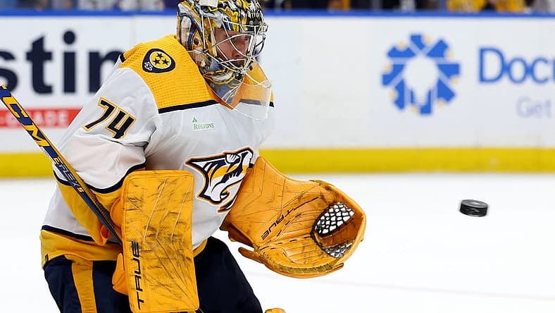 Dec 3, 2023; Buffalo, New York, USA;  Nashville Predators goaltender Juuse Saros (74) looks to make a save during the second period against the Buffalo Sabres at KeyBank Center. Mandatory Credit: Timothy T. Ludwig-USA TODAY Sports