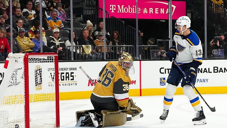 Dec 4, 2023; Las Vegas, Nevada, USA; St. Louis Blues right wing Alexey Toropchenko (13) scores a goal against Vegas Golden Knights goaltender Logan Thompson (36) during the first period at T-Mobile Arena. Mandatory Credit: Stephen R. Sylvanie-USA TODAY Sports