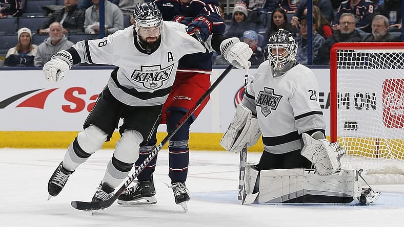 Dec 5, 2023; Columbus, Ohio, USA; Los Angeles Kings defenseman Drew Doughty (8) and Columbus Blue Jackets left wing Dmitri Voronkov (10) battle for position in front of goalie Pheonix Copley (29) during the first period at Nationwide Arena. Mandatory Credit: Russell LaBounty-USA TODAY Sports