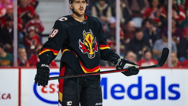 Dec 5, 2023; Calgary, Alberta, CAN; Calgary Flames left wing A.J. Greer (18) during the first period against the Minnesota Wild at Scotiabank Saddledome. Mandatory Credit: Sergei Belski-USA TODAY Sports