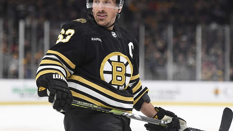 Dec 7, 2023; Boston, Massachusetts, USA; Boston Bruins left wing Brad Marchand (63) looks over at the linesman after an offside call during the first period against the Buffalo Sabres at TD Garden. Mandatory Credit: Bob DeChiara-USA TODAY Sports