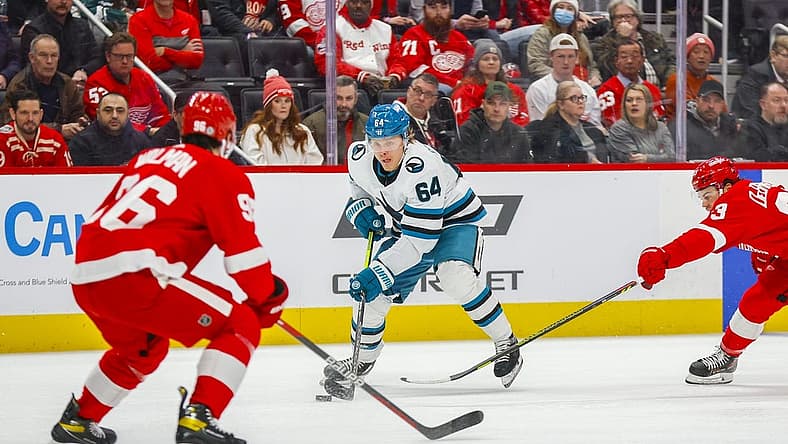 Dec 7, 2023; Detroit, Michigan, USA; San Jose Sharks center Mikael Granlund (64) handles the puck during the first period at Little Caesars Arena. Mandatory Credit: Brian Bradshaw Sevald-USA TODAY Sports