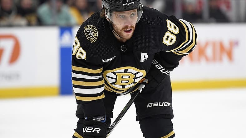 Dec 7, 2023; Boston, Massachusetts, USA; Boston Bruins right wing David Pastrnak (88) gets set for a face off during the second period against the Buffalo Sabres at TD Garden. Mandatory Credit: Bob DeChiara-USA TODAY Sports