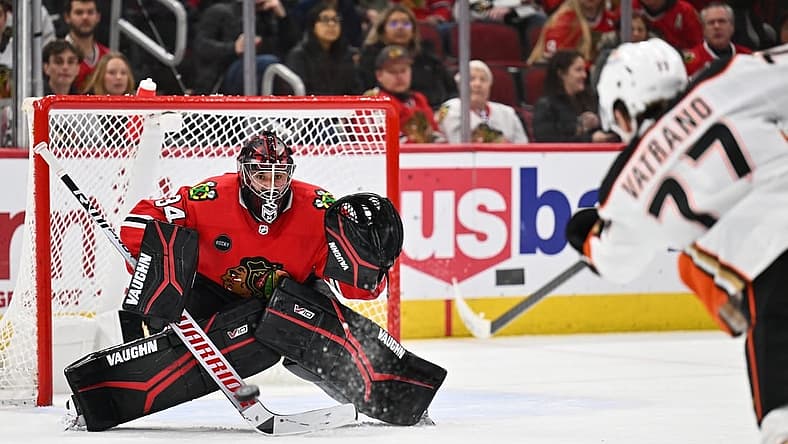 Dec 7, 2023; Chicago, Illinois, USA; Chicago Blackhawks goaltender Petr Mrazek (34) tracks a shot from Anaheim Ducks forward Frank Vatrano (77) in the second period at United Center. Mandatory Credit: Jamie Sabau-USA TODAY Sports
