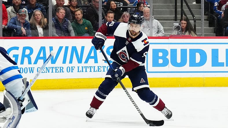 Dec 7, 2023; Denver, Colorado, USA; Colorado Avalanche left wing Tomas Tatar (90) shoots the puck in the second period against the Winnipeg Jets at Ball Arena. Mandatory Credit: Ron Chenoy-USA TODAY Sports