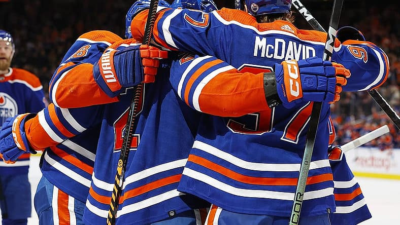 Dec 8, 2023; Edmonton, Alberta, CAN; The Edmonton Oilers celebrate a goal scored by defensemen Evan Bouchard (2) during the first period against the Minnesota Wild at Rogers Place. Mandatory Credit: Perry Nelson-USA TODAY Sports