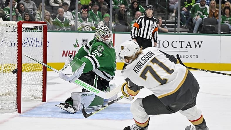 Dec 9, 2023; Dallas, Texas, USA; Dallas Stars goaltender Jake Oettinger (29) stops a breakaway shot by Vegas Golden Knights center William Karlsson (71) during the first period at the American Airlines Center. Mandatory Credit: Jerome Miron-USA TODAY Sports