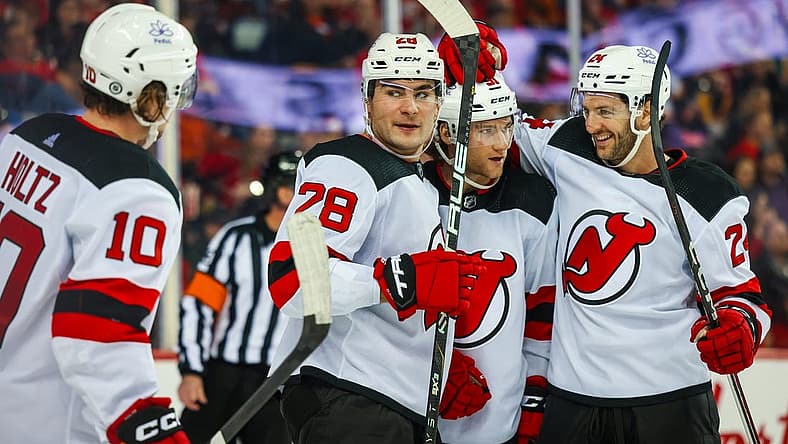 Dec 9, 2023; Calgary, Alberta, CAN; New Jersey Devils right wing Timo Meier (28) celebrates his goal with teammates against the Calgary Flames during the third period at Scotiabank Saddledome. Mandatory Credit: Sergei Belski-USA TODAY Sports