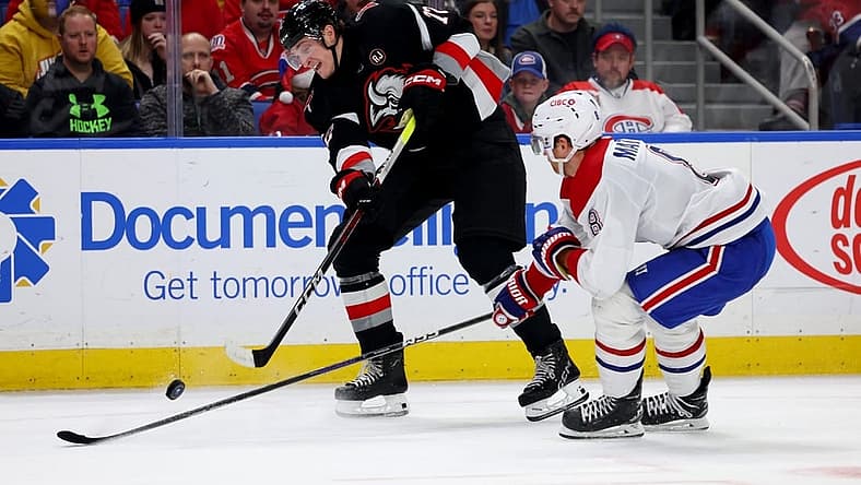 Dec 9, 2023; Buffalo, New York, USA; Montreal Canadiens defenseman Mike Matheson (8) tries to block a shot by Buffalo Sabres right wing Tage Thompson (72) during the second period at KeyBank Center. Mandatory Credit: Timothy T. Ludwig-USA TODAY Sports