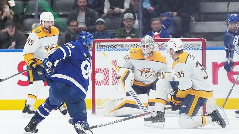 Dec 9, 2023; Toronto, Ontario, CAN; Toronto Maple Leafs right wing William Nylander (88) shoots the puck on Nashville Predators goaltender Kevin Lankinen (32) during the second period at Scotiabank Arena. Mandatory Credit: Nick Turchiaro-USA TODAY Sports